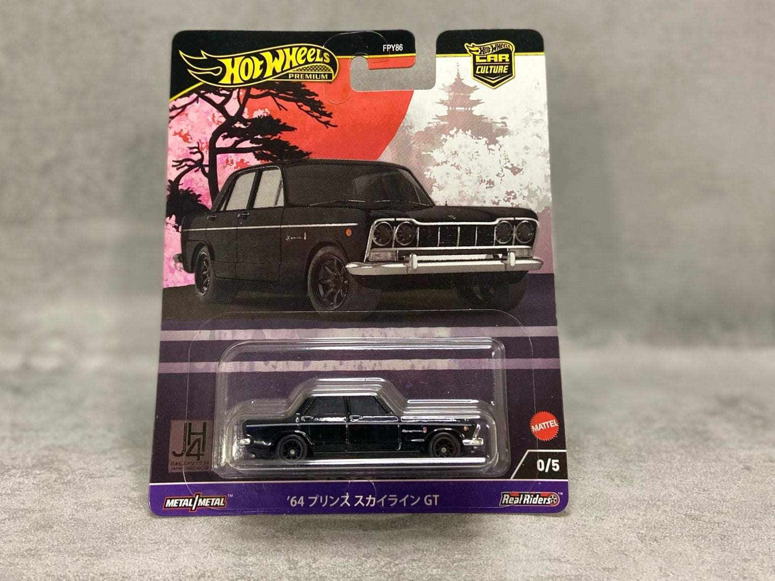 Hot Wheels Japan Historics '84 Nissan Prince Skyline Chase – mașinuță 1:64 cu design legendar și detalii de colecție

