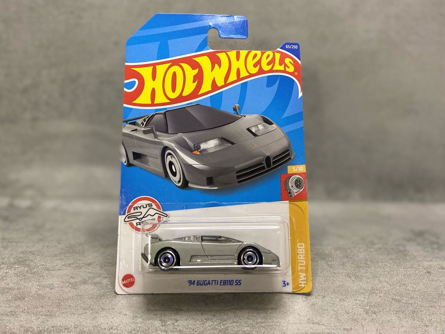 Hot Wheels Bugatti EB110 SS – mașinuță premium 1:64 cu design futurist și detalii autentice de supercar italian

