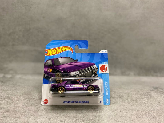 Hot Wheels – Nissan Skyline RS KDR30 – Model 1:64 cu design JDM și detalii autentice

