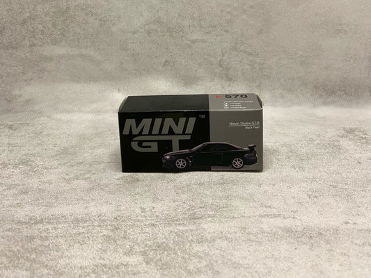 Mini GT Nissan GT-R R34 Black Pearl – mașinuță 1:64 JDM fără sigiliu de fabrică